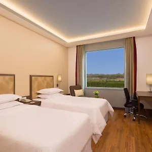 Отель Four Points By Sheraton New Delhi, Airport Highway